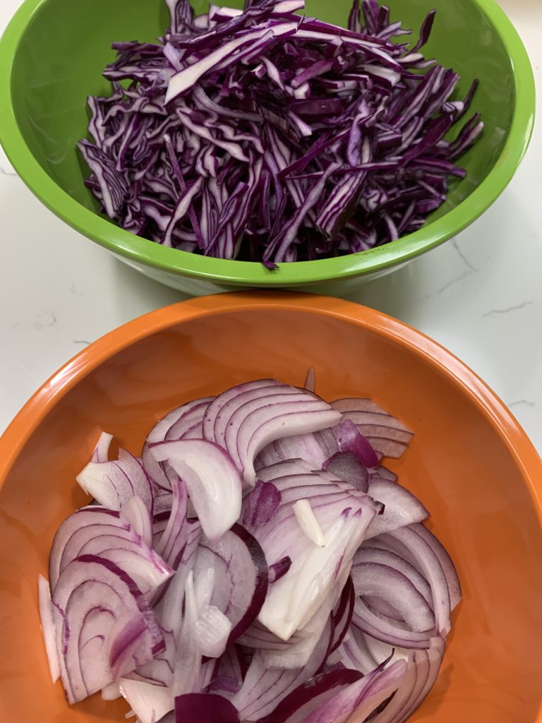 red cabbage and red onions sliced thinly for tacos
